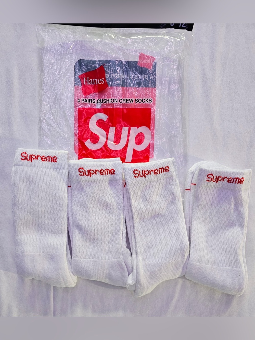 Hanes Supreme White Crew Socks with Red Logo - 4 Pack